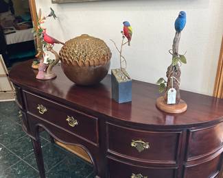 These are hand carved bird sculptures by various listed artists
Beautiful mahogany sideboard