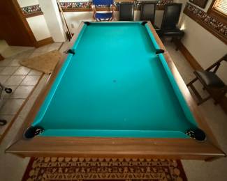 Pool table was originally from an old pool hall downtown it is approximately 50 years old