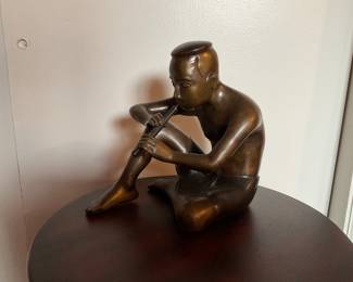Bronze Sculpture of a Young Flute Player