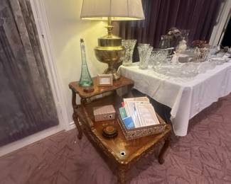 a pair of two tiered wood side tables