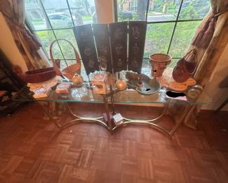 Mid century modern brass and glass top table with baskets shaped like animals