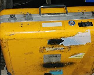 We strongly believe this is likely an inflatable life raft from aboard a jet that is still sealed inside this case. It will be zip-tied shut for safety, just in case. 😀