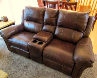 Leather power reclining sofa with storage