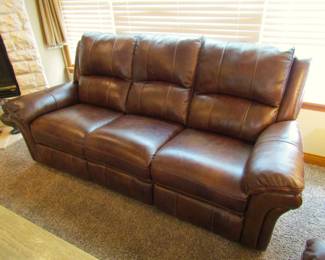 Leather power reclining sofa