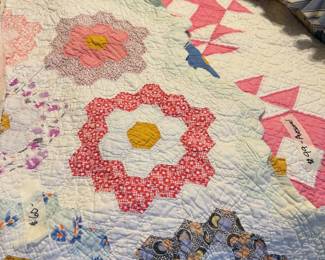 Lots of vintage handmade quilts