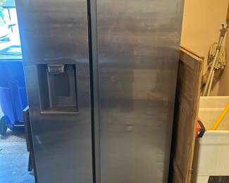 Nice side-by-side Samsung refrigerator!