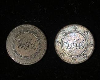 Pair of cuff links: Two 1856 Liberty Seated Dimes that have been engraved as love tokens. Love tokens are coins that have been engraved after the minting process was complete and were often given as gifts.