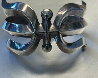 Sterling sand cast bracelet.