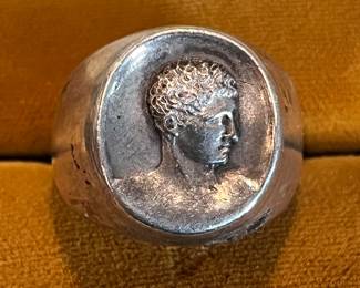 French silver ring of a classic male profile.