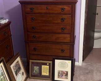 Chest of Drawer that goes with bedroom suite along with several wall pictures.