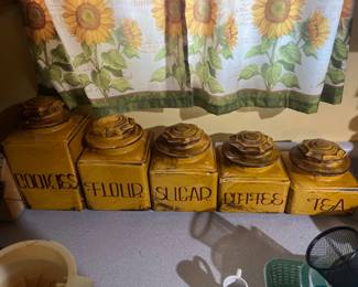 Kitchen counter. Mother used these on a regular basis. Probably still flower and sugar in the jars.