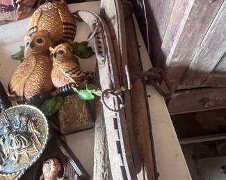 Located in garage. Pair of mule yokes, a single tree, and Home Interior pieces.