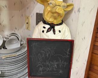 Pig chef with chalkboard