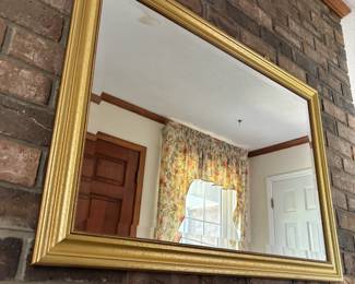 Gold framed mirror