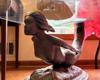 Glass top mermaid table