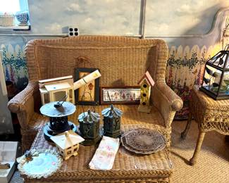 Wicker loveseat and coffee table