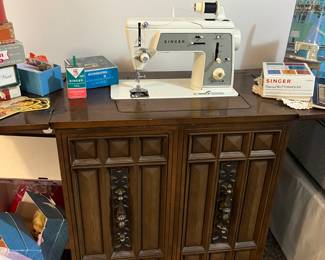 Singer Sewing Machine in cabinet