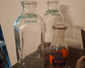 Several Adrian Glass Milk Bottles!
