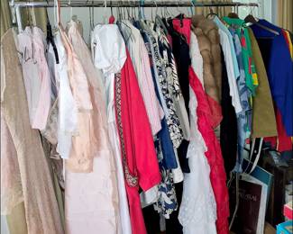 Vintage Clothes -- There are French Silk Bed Jackets, Old Wedding and Prom Dresses, Old School Jams, Mink Stoles, etc.