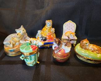 Collection of Limoges boxes with cats