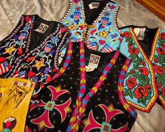 Vest with ornate hand beaded designs. Size small. New with tags.