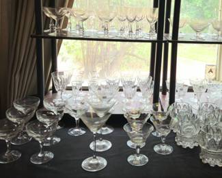 Baccarat (back) and other crystal cocktail and bar ware stems.