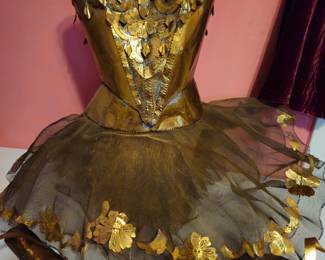 Unusual metal tabletop sculpture of a ballet tutu and toe shoes of brass and gold wire by