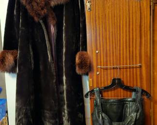 Sheared mink coat with contrasting collar and cuffs.