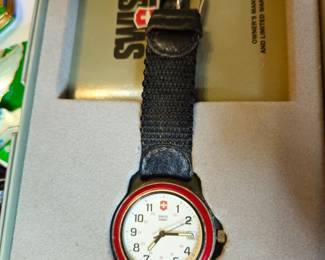 Swiss Army watch in fitted original box with papers.