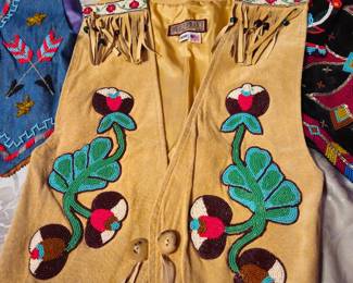 Soft shami leaather vest with applique and beaded design. Size small