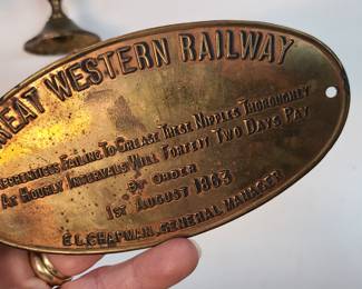 brass décor sign