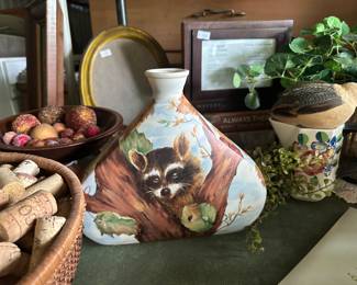 Porcelain vase with handpainted raccoon