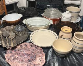 Pyrex, stoneware, silver in the kitchen, along with appliances and utensils for any serious cook!