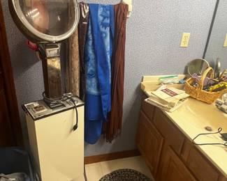 She was a beautician- cool books, vintage tools including rolling hair dryer