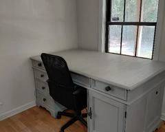 Large Desk Light Gray with 3-Drawers Left, 1-Center, 1-Right and Cabinet on bottom Right. Could seat someone other side and become 2-desks in one. Black Chair included. Top is removable so top and 2-drawer/cabinet sections is easily moved.