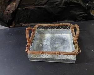 Galvanized Metal bottom with wicker handles square tray, many uses for this item come to mind. Rustic decor.
