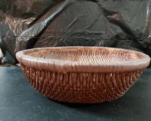 Round Decorative Brown Basket, perfect size for many different uses.