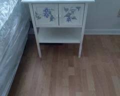 Very cute white side table with morning glory flowers painted on it. Matches lot #16. Lamp not included