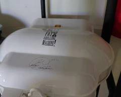 George Foreman Lean Mean Grilling Machine, works great, very clean.