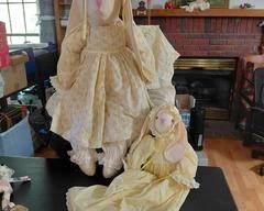 Collector handmade rabbits, mother and baby all dressed up in Sunday best. Good Condition.