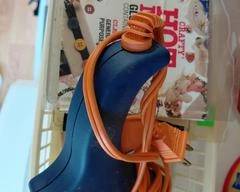 Glue Gun and Glue Sticks in Basket, ready for any project.