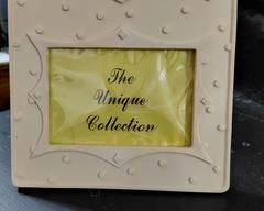 Sandstone looking picture frame, The Unique Collection, new condition.