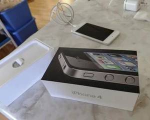 iPhone 4 in box, charging cord, ear pods. New condition, unlocked.