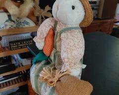 Very Cute handmade rabbit, ready for spring, straw hat, striped overalls, carrot, and burlap bags, it is adorable. Great condition, perfect for the collector.
