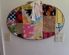 Wooden oval quilting hoop frame, used here as a decorative wall decor, it can be used as quilting frame or as decorative items as shown here.