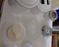 Entire Shelf Misc. Kitchen Items, plastic containers with lids, & funnels-all sizes.