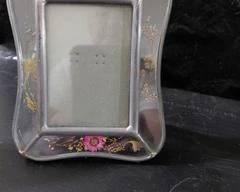 Small Lead Picture frame with real pressed flowers, very unique.