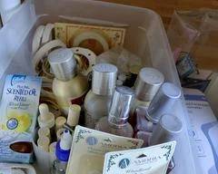 Scented Oils with Lamp Rings, Plug-Ins, and more. Includes container.