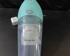 Black + Decker Quick Clean Up Handheld Vacuum, clean and ready to use. Plug-in charging system, charged and ready to use.