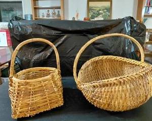 Woven baskets (2), large and small.